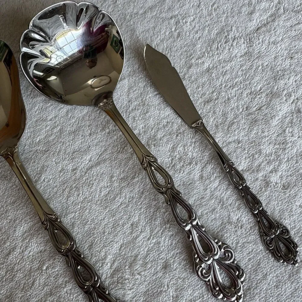 Vintage 7-piece Oneida Community Chandelier serving utensil set in stainless MCM